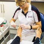 Judith Cowling Podiatrist treating a patient with nail problems at Foot Talk Podiatry